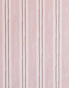 a pink and white striped wallpaper with red lines on the bottom half of it