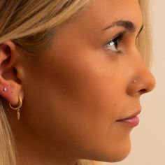 Adorn your nose in timeless style with this gift set of three diamond nose rings. Featuring a 14K white gold baguette, round, and perlage diamond design, its delicate beauty adds a sophisticated touch to your piercing. Crafted with exceptional quality, this trio is the perfect addition to your piercing collection. 20G Genuine VS1 Diamonds, G-H color Each diamond measures 1.5mm (.015ct) Solid 14k gold | Nickel-free | Hypoallergenic Ethically handmade in the USA Dainty Nose Piercing, Diamond Nose Piercing, Small Nose Studs, Piercing Collection, Diamond Nose Ring, Nose Piercing Stud, Small Nose, Cool Ear Piercings, Vs1 Diamond