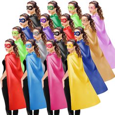 a group of people wearing different colored capes