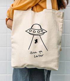 See Ya Later Tote Bag Tote Bag Designs Paint, Canvas Bag Painting Ideas Easy, Drawing On Bags Ideas, Tote Bag Diy Design, Tote Bag Diy Paint, Tote Bag Ideas Design, Desain Tote Bag Simple, Tote Bag Drawing Ideas