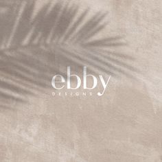 the logo for ebby designs is shown in front of a beige background with palm leaves