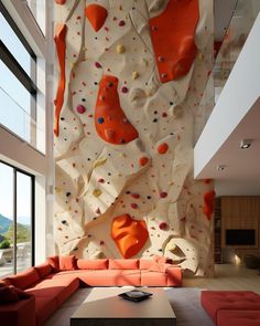 a living room filled with furniture and climbing wall