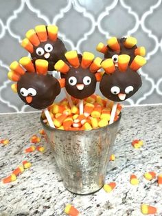 chocolate covered candies in a bucket with candy eyes