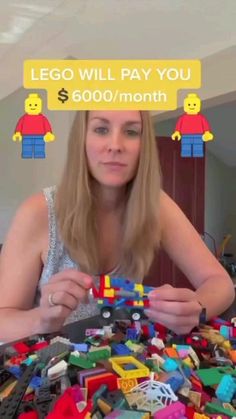 a woman sitting in front of a table filled with legos and building blocks that say, lego will pay you $ 600 / month