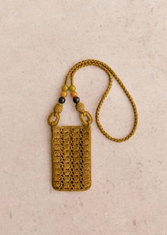 Crossed over;Hand-woven raffia;Made in our Madagascan workshop;Raffia exterior;Unlined;Resin beads;Length of handle: 51 cm / 20 in;Due to its construction, this model does not have an inside pocket;Dimensions: 18 x 0.7 x 11 cm / 7 x 0 x 4.3 in Crochet Bags With Beads, Granny Square Crochet Patterns Free, Macrame Bag, Woven Raffia, Craft Bags, Basket Bag, Resin Beads, Handle Bag, Parisian Style