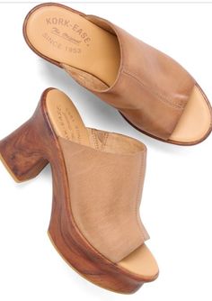 Take your outfit to the next level with our Cassia Platform Sandal in Brown Terra! These gorgeous and comfortable sandals are perfect for day to night wear, thanks to their cushioned footbed and high-traction rubber outsole. Made with hand-finished Italian leather and a faux wood covered platform heel. 3.75" heel height, 1.5" platform Wood Cover, Night Wear, Platform Heel, Brown Sandals, Comfortable Sandals, Faux Wood, Small Tops, Platform Heels, Sweater Accessories