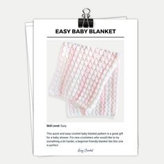 the easy baby blanket pattern is shown in pink and white