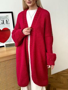 This unique pop-art style knitted cardigan is fully handmade of high quality wool blend yarn. The picture on the back is embroidered by hands. This cardigan can be customised. You can choose the colours you prefer. Red Knit Long Sleeve Cardigan, Red Long Sleeve Knit Cardigan, Handmade Knit Cardigan In One Size, Handmade Knit One-size Cardigan, Handmade One-size Knit Cardigan, Winter Hand Knitted Acrylic Cardigan, Hand Knitted Acrylic Cardigan For Winter, Trendy Handmade Knit Cardigan, Handmade One-size Sweater