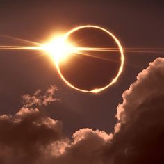 the solar eclipse is seen through clouds in this image