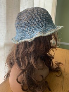 A multicolored floppy bucket hat featuring lots of blue hues variegating to a light blue and white brim 💙 1 size fits most for adults! Made with 00% acrylic yarn 🧶 Casual Blue Wide Brim Bucket Hat, Blue Lightweight Casual Bucket Hat, Blue One Size Bucket Hat For Vacation, One Size Blue Bucket Hat For Vacation, Light Blue Casual Bucket Hat For Beach, Casual Lightweight Blue Bucket Hat, Casual Light Blue Bucket Hat For The Beach, Casual Light Blue Bucket Hat For Beach, Blue Bucket Hat With Curved Brim For Spring