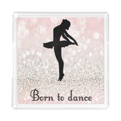 an acrylic sign that says born to dance with a silhouette of a ballerina