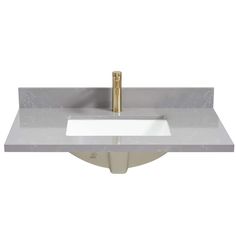 a bathroom sink with a gold faucet on the top and marble countertop