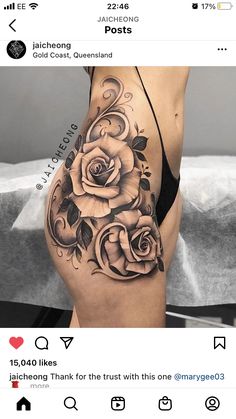 a woman's stomach with roses on it