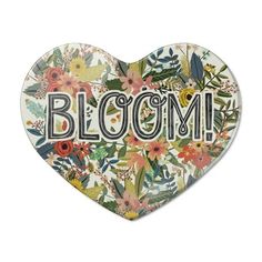 a heart shaped sticker with the word bloom written in florals and leaves on it