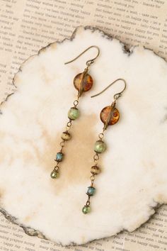 The Rustic Creek Collection is a crowd favorite. Featuring designs that are a must-have for every season and pairs well with any outfit. Antique Brass (Lead & Nickel Free) Czech Glass 3" with antique brass ear wires We hand select our natural materials, thus there may be slight variations in color and/or size that will not detract from the overall aesthetic. Our unique handcrafted designer jewelry for women is made in America, each design created individually in our personal design studio in Flo Vintage Beads Jewelry, Handmaid Jewelry Ideas, Elegant Cheap Czech Glass Earrings, Czech Beads Jewelry Bracelets, Vintage Beaded Jewelry, Czech Glass Earrings, Unique Jewelry Inspiration, Handmade Earrings Ideas, Multicoloured Earrings