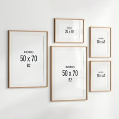 four framed photographs hang on the wall next to each other, with numbers in them