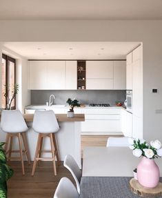 the kitchen is clean and ready to be used as a dining room or living room