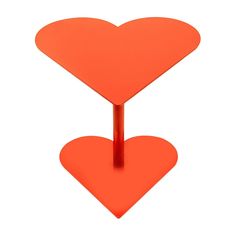 an orange heart shaped stand on top of a white background with no image to describe