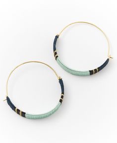 two pairs of hoop earrings with blue and green beads