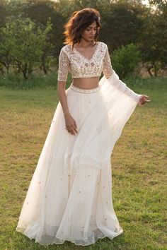 Luxury White Lehenga For Spring, Luxury White Traditional Wear For Festivals, Luxury Elegant White Choli, Bohemian Blouse With Dupatta For Traditional Ceremonies, Luxury White Traditional Wear For Semi-formal Occasions, Luxury White Unstitched Lehenga, White Embroidered Luxury Choli, Luxury Off White Organza Lehenga, Luxury Off-white Traditional Wear For Diwali