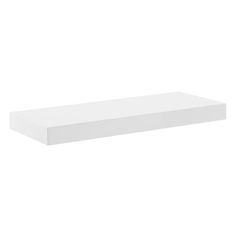 an empty white shelf on a white wall