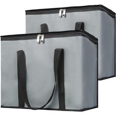 two gray bags with black handles and straps