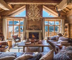 a living room filled with furniture and a fire place