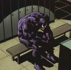 a cartoon character sitting on a bench in the middle of a room with lockers