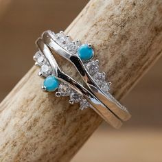 What's better than having too much bling?! Our Turquoise & CZ Wishbone Stacker Set highlights a unique, country chic style. This set is the perfect touch to pair beautifully with a ring of your own, or even with majority of our popular women's designs! ABOUT THIS RING Metal: 925 Sterling Silver, Rhodium Plating Stones: Turquoise, Cubic Zirconia IN A RUSH This product can be expedited for an extra $12. Select expedited order at checkout. QUESTIONS ABOUT SIZING Go to our Ring Sizing Guide for Chevron Wedding Ring, Real Turquoise Jewelry, Stone Stacking, Antler Ring, Turquoise Rings, Ring Metal, Genuine Turquoise, Unique Engagement, Engagement Jewelry