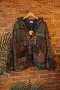 "Stunning patchwork jacket made with 100% recycled cotton outer, and 100% recycled fleece inner. Thick and cozy! Hooded with a zipper and outer pockets. Each is one-of-a-kind and will not be the exact jacket in the photos, but will be very close in color!   Fits XS-XXL Bust- 48\" Waist- 47\" Length - 29\"" Fem Clothes For Men, Vest With Hoodie, Plus Size Boho Grunge Outfits, Fun Jacket, Hobo Clothes, Earthy Outfits Masc, Cozy Clothing, Grunge Hoodies, Cute Zip Up Hoodie