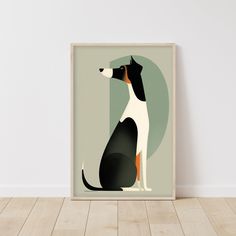 a black and white dog sitting on top of a wooden floor next to a wall