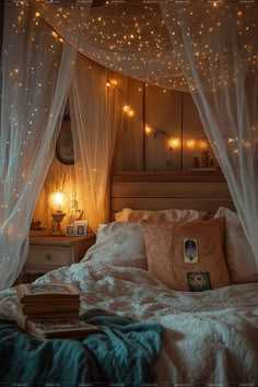 a bed with white curtains and lights on it