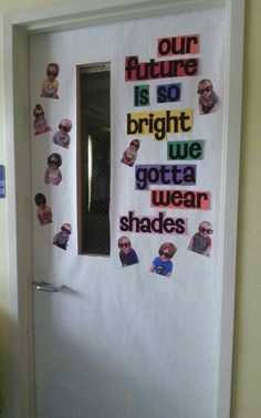 a door decorated with pictures and words that say our future is so bright we got a wear shades