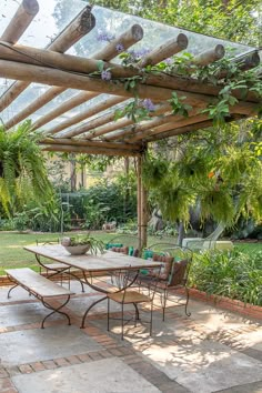 an outdoor dining area with tables and chairs