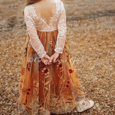 Beautiful embroidered classic ivory white lace and burnt orange Bohemian style flower girl dress.   A lined bodice with 3/4 long length sleeves. An off white lace upper bodice, with a layered long rustic embroidered tulle flowing skirt - the back of the bodice features a beautiful crossed, sheer eyelash lace back.    Option with slim glamour sash. Available in ages 6 months to 13 years - the sizes are given in average ages for UK and USA children with average body size for that age group.   A tr Fall Wedding Junior Bridesmaid Dresses, Flower Girl Dresses For Fall Wedding, Rust Orange Flower Girl Dress, Flower Girl Fall Dresses, Fall Flower Girl Dress, Flower Girl Dresses Burnt Orange, Burnt Orange Flower Girl Dresses, Western Flower Girl, Rustic Flower Girl Dresses