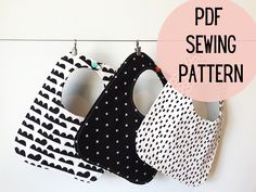 three bibs hanging on a clothes line with the words free sewing pattern below it