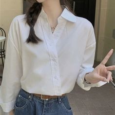 .sizingSection_variants__vrALN{float: left}Long-Sleeve Asymmetrical Plain Shirt Total Length Bust Sleeve Length 67 122 48 measurement is cm.Product Information Material: 35% Cotton, 65% Polyester Color: White Plain Shirt, Plain Shirts, Chic Style, Almond