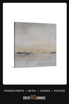 an abstract painting with white and grey colors on the canvas, framed in black frame