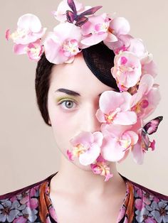 a woman with flowers in her hair