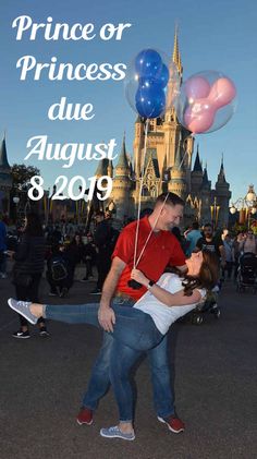 a man and woman dancing in front of a castle with balloons that read prince or princess due august 8, 2009