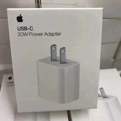 an apple usb - c power adapter in its box