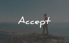 a person standing on top of a mountain with the word accept above them in white