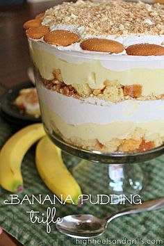 banana pudding trifle on a glass plate with two bananas