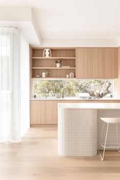 the kitchen is clean and ready to be used as a dining room or office space