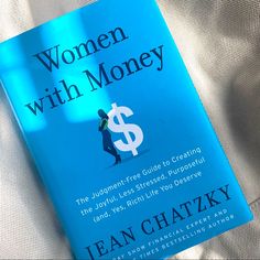 a blue book with the title women with money