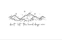 mountains with the words don't let the hard days win