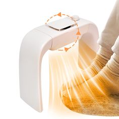 a person standing next to a foot warmer