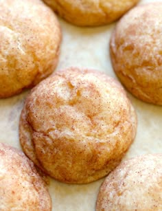 some sugary muffins are on a baking sheet