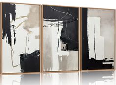 three black and white paintings hanging on a wall