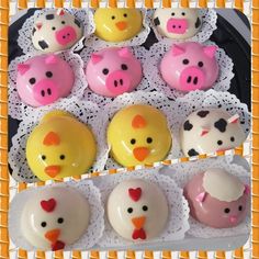 there are many cupcakes decorated with farm animals on the top one is pink, yellow and white